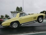 1967ChevroletCorvette-yellow-hardtop-wheelstand.jpg